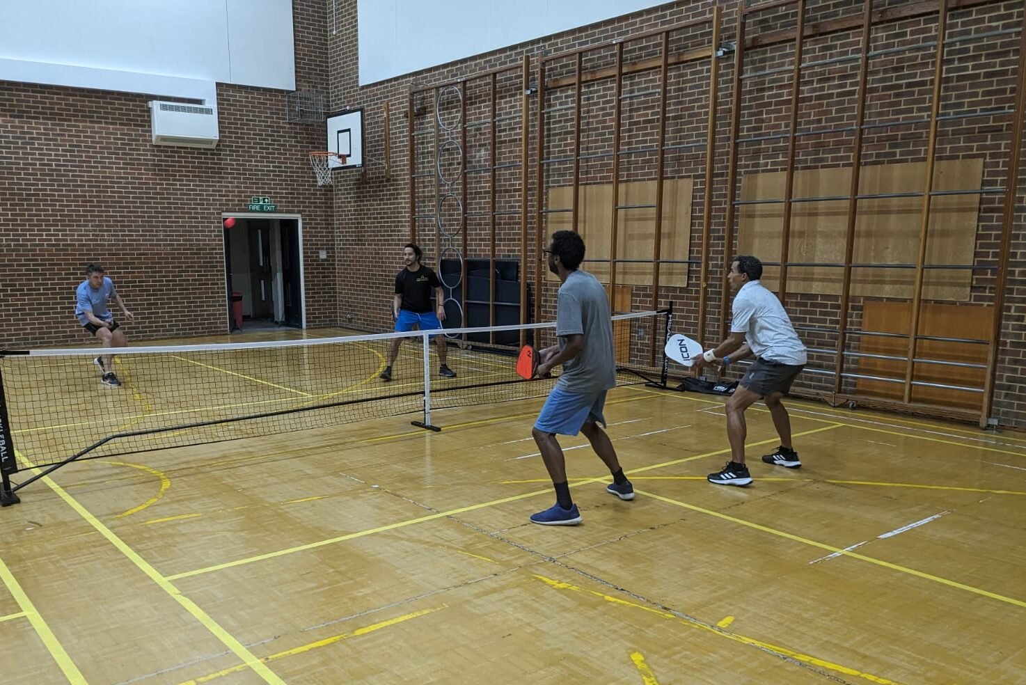 Lemon Pickleball's first session, with players enjoying a competitive match