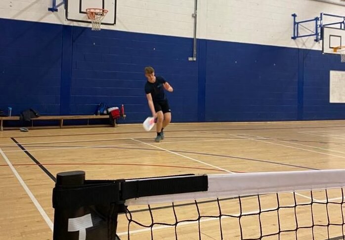 Nathan executing a forehand at one of our pickleball intermediate sessions