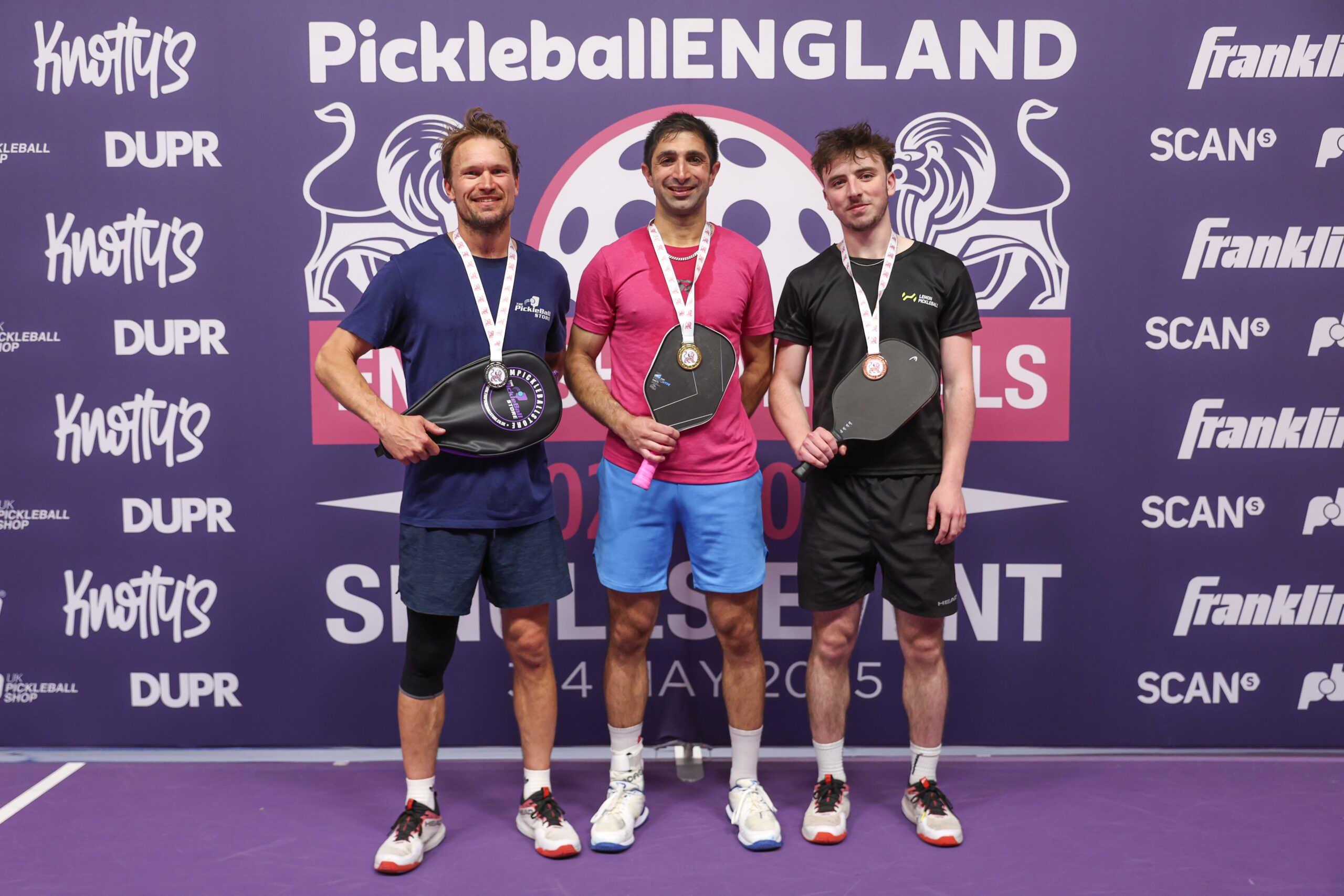 Lemon Pickleball players with tournament medals